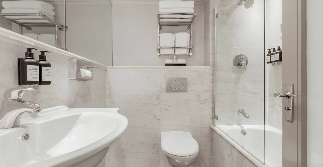 Marble bathroom with bath, shower and basin