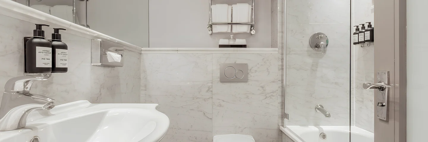 Marble bathroom with bath, shower and basin