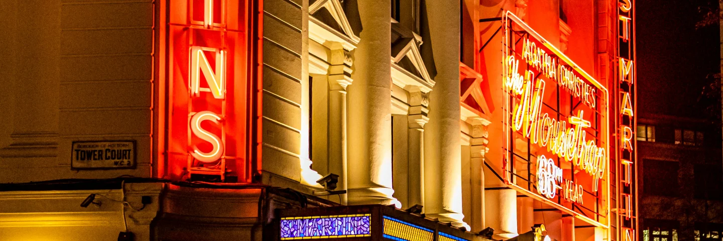 St Martin’s Theatre illuminated at night in London’s West End